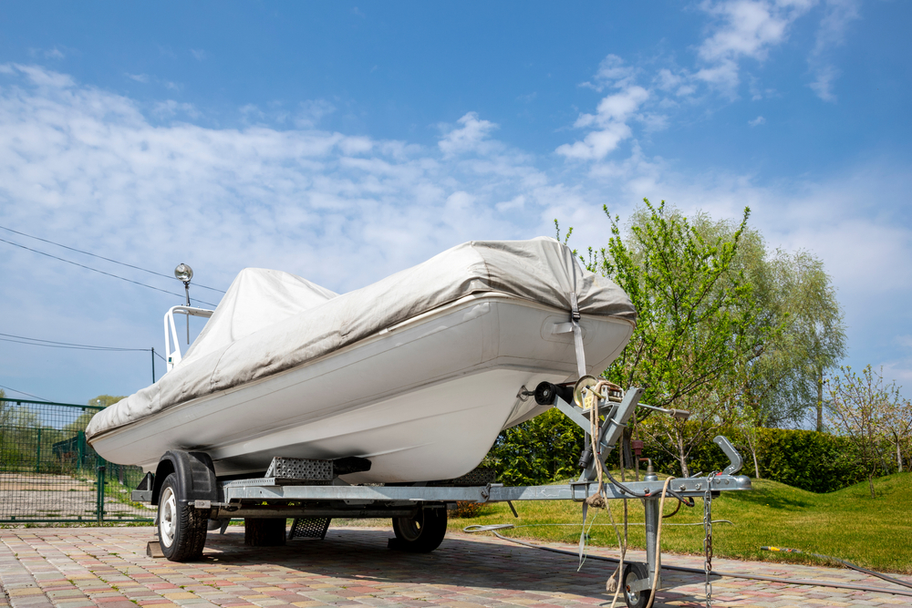 Big,modern,inflatable,motorboat,ship,covered,with,grey,or,white